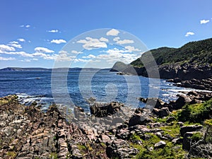 A view of the rocky shoreline along the east coast trail the vast Atlantic while hiking outside of St. JohnÃ¢â¬â¢s, Newfoundland a